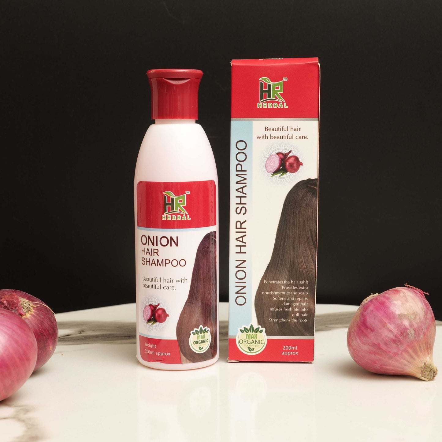 Onion hair shampoo bottle and packaging with onions on a dark background